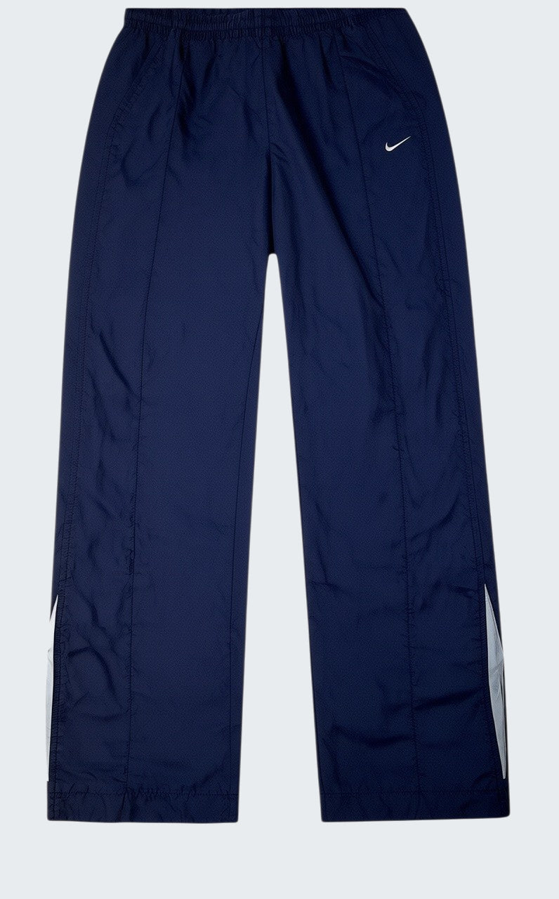 Nike Vintage Trackpants Kids L fit Xs baggy 73 89 [photoroom-buegeln-bg-e9ecef-v1] [sha:842ff5e81484] [bg:#E9ECEF] [source_image:86113796325640]