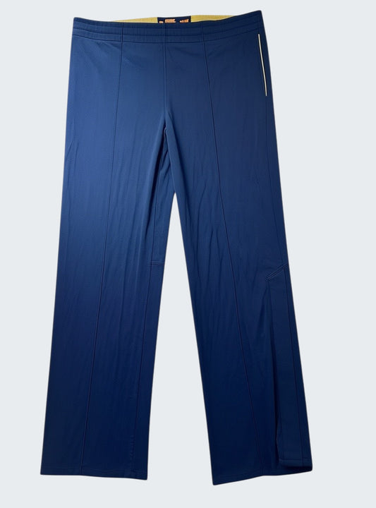 Nike vintage Trackpants L baggy 7-2-0-7 [photoroom-buegeln-bg-e9ecef-v1] [sha:2c3f641e1b26] [bg:#E9ECEF] [source_image:86113817297160]