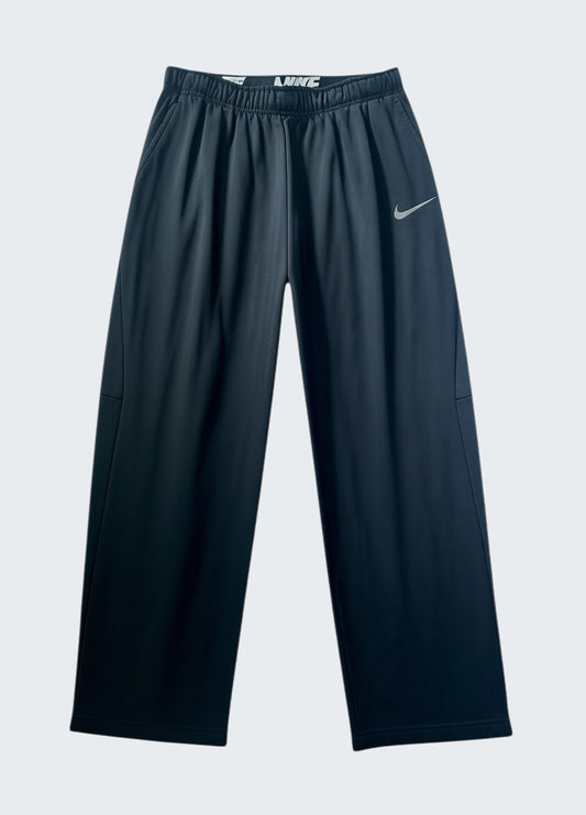 Nike vintage Trackpants L fit XS baggy 730 5 [photoroom-buegeln-bg-e9ecef-v1] [sha:2e778763b4f5] [bg:#E9ECEF] [source_image:86113770569992]