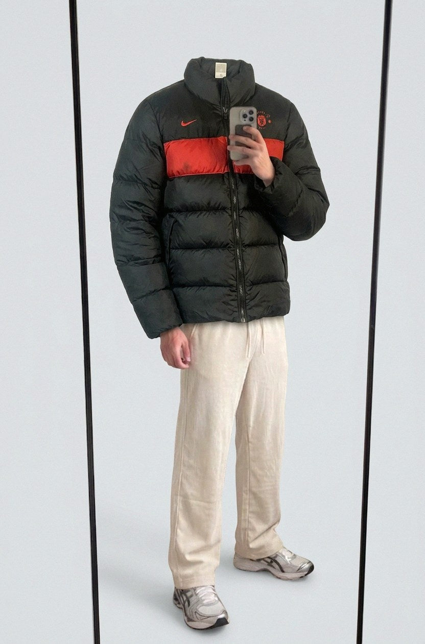 Vintage Nike Winterjacke M fit L 5-7-7-2 – getragenes Produktfoto