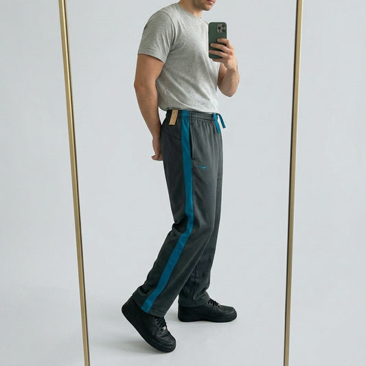 Nike Vintage Gefütterte Track Pants M | Baggy Trackpants 5-4-3-3 – getragenes Produktfoto
