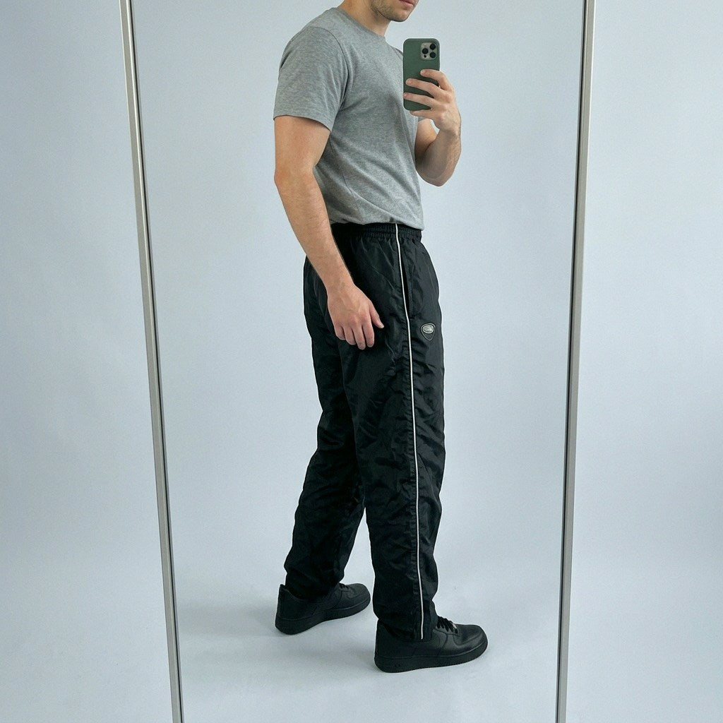 Vintage Nike Trackpants XL fit M 5-3-7-7 – getragenes Produktfoto